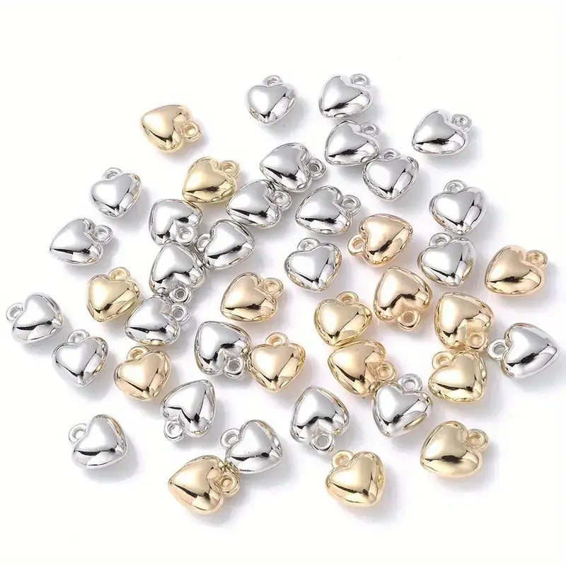 dijes corazon plateado dorado