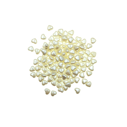 Cuenta Corazon Color Crema 9mm.